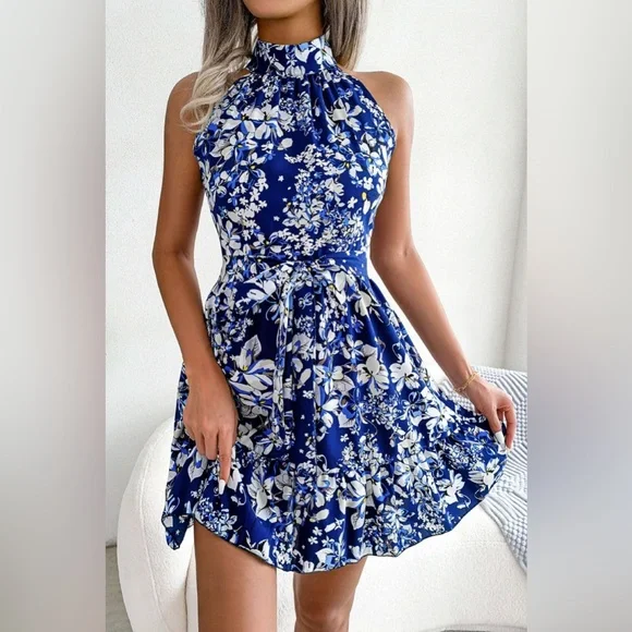LM | Floral trapeze dress with bow belt at the waist and ruffled hem